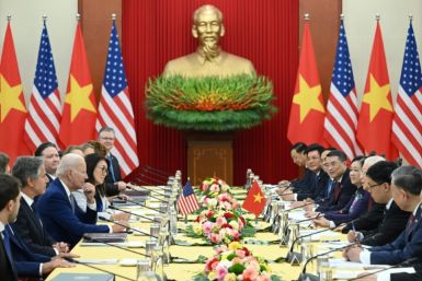 President Joe Biden and Vietnam's Communist Party chief Nguyen Phu Trong said the competing claims on the strategic waterway must be settled under international norms