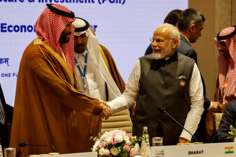 Indian Prime Minister Narendra Modi shakes hands with Saudi Arabia's Crown Prince Mohammed bin Salman (L) at the G20 Leaders' Summit, where the two joined other world leaders in unveiling plans to create a modern-day Spice Route to help boost trade