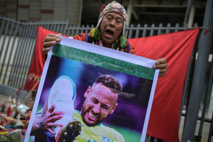 A group of traditional healers from the jungle, mountains, and coastal areas, called on "Tayta Inti" (Father Sun) to help Peru in its match against five-time World Cup winners Brazil