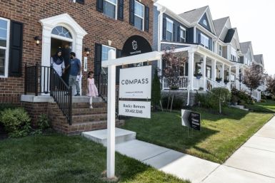 Prospective home buyers leave a property for sale  in Clarksburg, Maryland on September 03, 2023