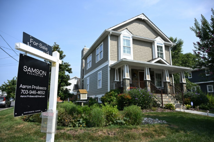 A sign advertises the pending sale of a home in Arlington, Virginia, on August 22, 2023