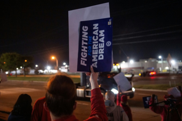 UAW members picket outside of the Local 900 headquarters across the street from a Ford assembly plant in Wayne, Michigan on September 15, 2023
