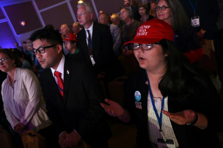 People pray and sing during a conservative Christian 'Pray Vote Stand' summit in Washington on September 15, 2023