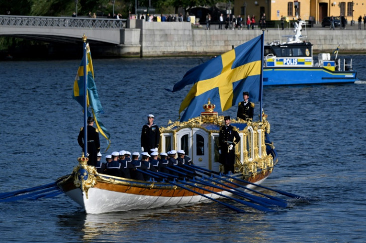 Swedish marines row a royal boat during the festivities which were to culminate in an outdoor concert