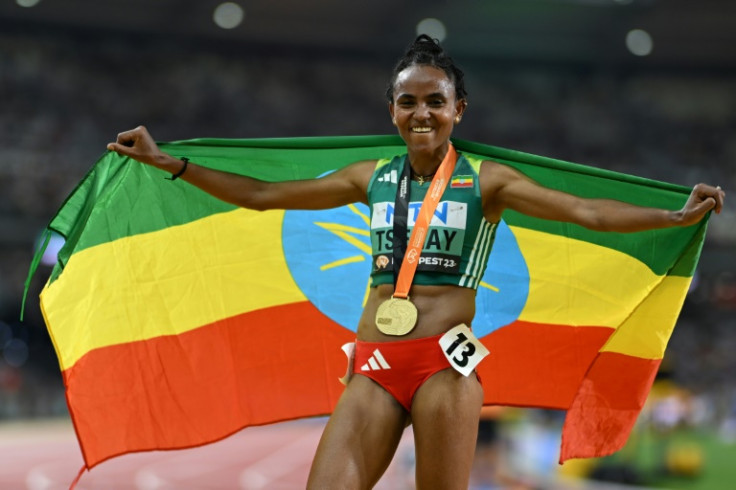 Ethiopia's Gudaf Tsegay, seen here celebrating her 10,000m world title, broke the 5,000m world record in winning at the Diamond League finals in Eugene, Oregon