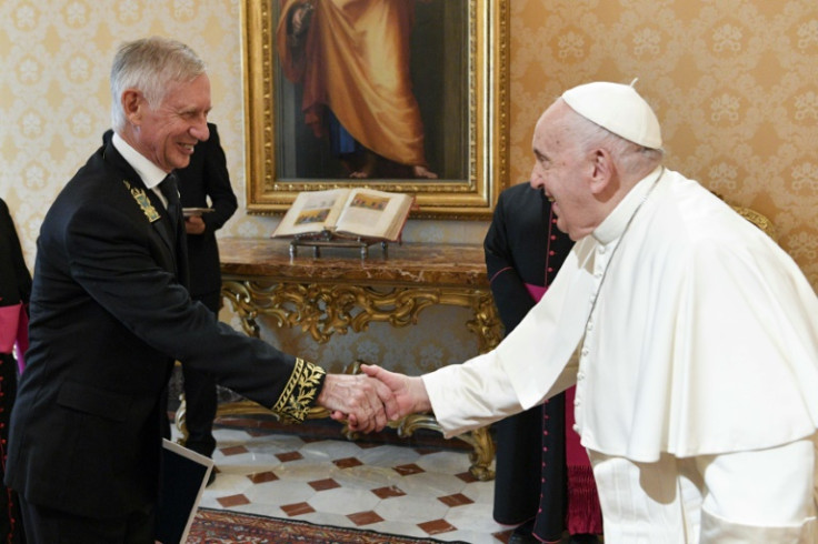 This photo taken and handout on September 18, 2023 by The Vatican Media shows Pope Francis welcoming Ivan Soltanovsky, Russian ambassador to the Holy See on the occasion of the presentation of his Credential Letters to the Pope in The Vatican.