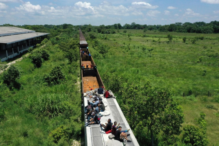 Migrants often climb on freight trains - including this one known as "The Beast" - on a dangerous journey through Mexico to the United States
