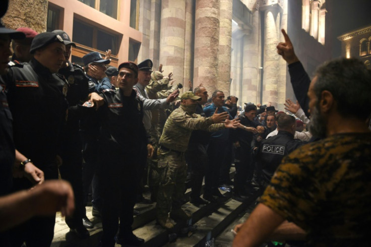 Protesters clash with police as in Yerevan as they urge Armenian Prime Minister Nikol Pashinyan to resign