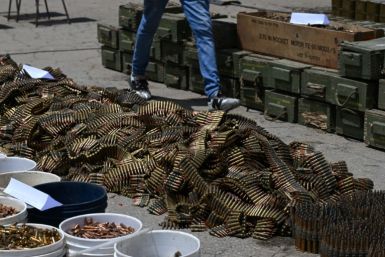 Buckets of bullets and ammunition belts were seized from within the prison