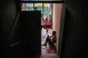 People displaced by the latest attack of gang violence take refuge in an abandoned movie theater converted into a shelter in Port-au-Prince, Haiti, on August 30, 2023