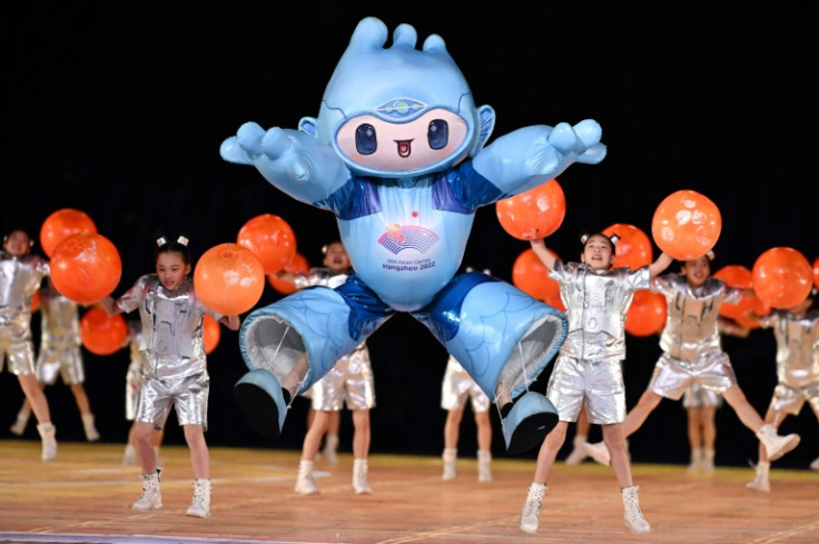 Performers take part in the opening ceremony of the 2022 Asian Games at the Hangzhou Olympic Sports Centre Stadium on Saturday night