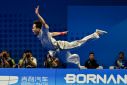 China's Sun Peiyuan on his way to gold in the men's changquan wushu final
