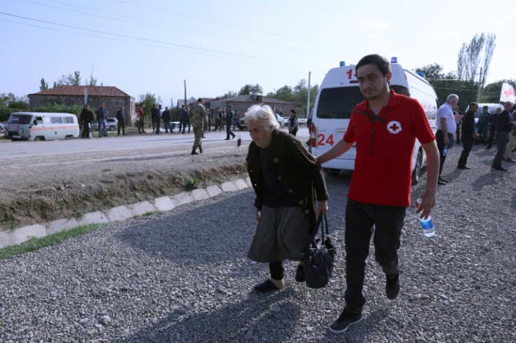 Red Cross workers are helping the Nagorno-Karabakh refugees find temporary homes in Armenia