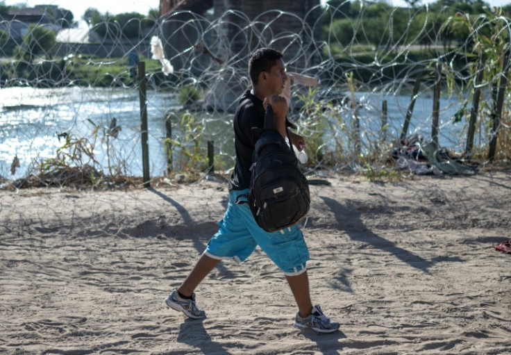 Victor Manuel Atencio walking on US soil near Eagle Pass, Texas on September 23, 2023