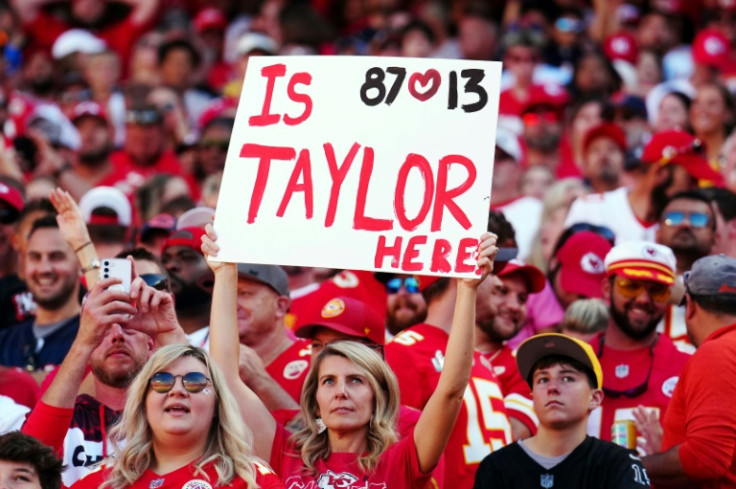 A Taylor Swift fan holds up a sign at the Kansas City Chiefs' NFL home win over the Chicago Bears, where Swift's attendance caused a stir