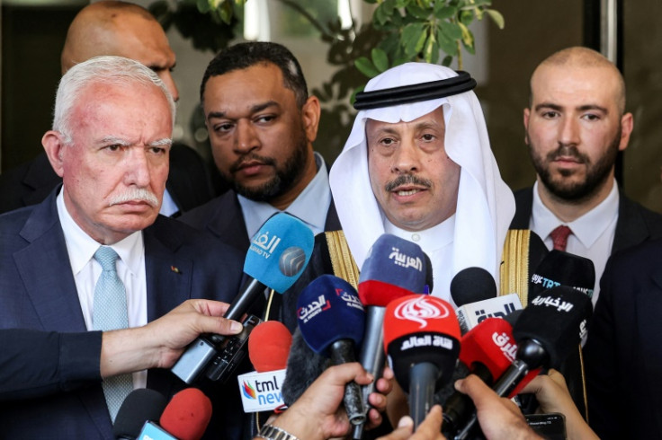 Saudi ambassador Nayef bin Bandar al-Sudairi speaks to journalists, joined by Palestinian foreign minister Riyad al-Maliki, on the left