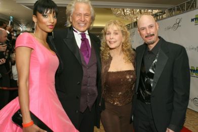 Peter Nygard (2nd-L, shown here at a gala in California in 2007) is accused of sex crimes in the United States and in Canada