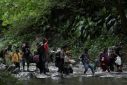 Every day, some 2,500 people fleeing violence and poverty across Latin America, and from some African and Asian nations, pass through the small town to start the 266-kilometer (165-mile) journey through the Darien Gap