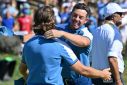 Rory McIlroy and Tommy Fleetwood secured a historic fourth straight win for Europe