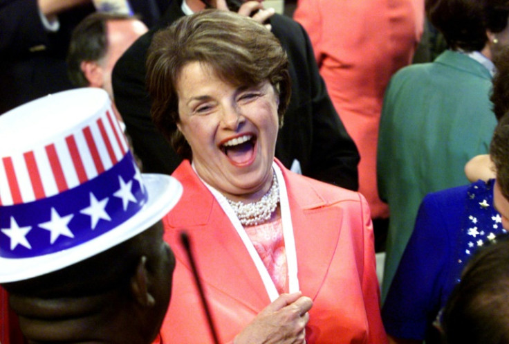 US Senator for California Dianne Feinstein laughs with a convention delegate at the Democratic National Convention (DNC) 14 August, 2000 at the Staples Center in Los Angeles, California. The featured speaker for the opening night of the DNC is US Presiden