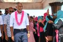 People's National Congress candidate Mohamed Muizzu (L) meets with supporters at a campaign rally in Thinadhoo ahead of the second round of Maldives' presidential election