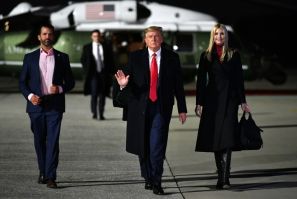 Then- US president Donald Trump is seen walking with his children Ivanka Trump (R) and Donald Trump Jr (L) January 4, 2021