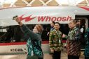 With a top speed of 350 kilometres (220 miles) per hour, the bullet train "Whoosh" can get between the capital Jakarta and Bandung in 45 minutes
