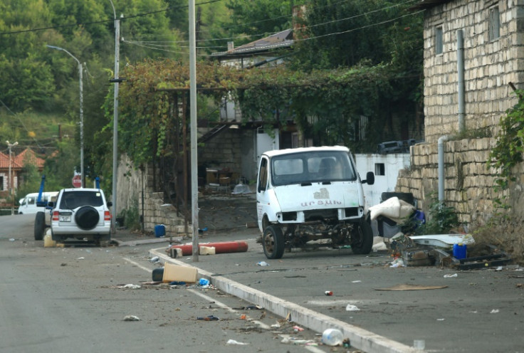 Abandoned vehicles in the abandoned capital on Monday