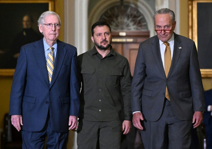 Ukrainian President Volodymyr Zelensky is seen in Washington with with US Senate leaders Chuck Schumer (R) and Mitch McConnell (L) during a visit aimed at keeping his war agenda high on the list of US priorities