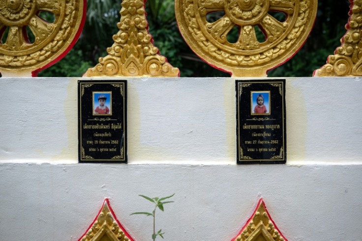 Plaques for three-year-old cousins Athipdin "Asian"  Srilumtai and Chaiyanon "Asean" Thongpuban, who were killed in a nursery massacre in 2022