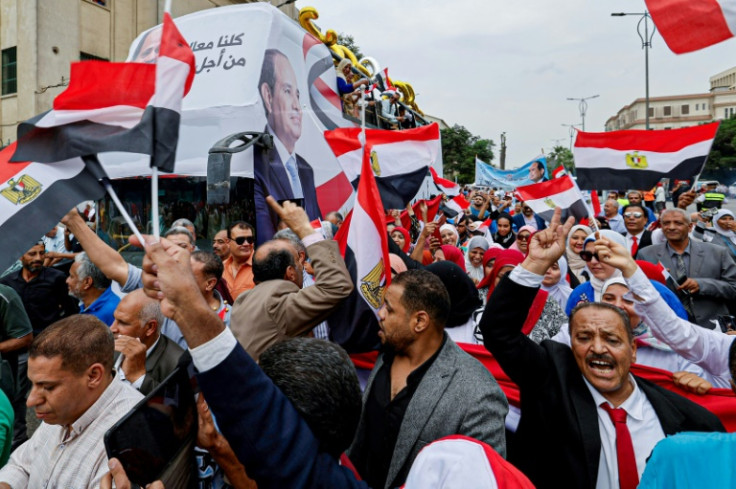 Sisi supporters hold a campaign rally outside the campus of Cairo University in Giza