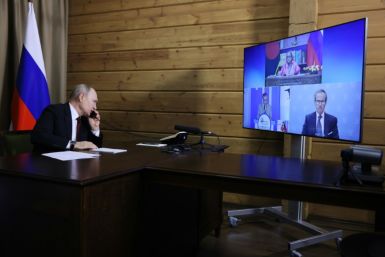 Bangladesh's Prime Minister Sheikh Hasina thanked Russian President Vladimir Putin (L) for "his guidance and assistance in implementing this project" during a videoconference