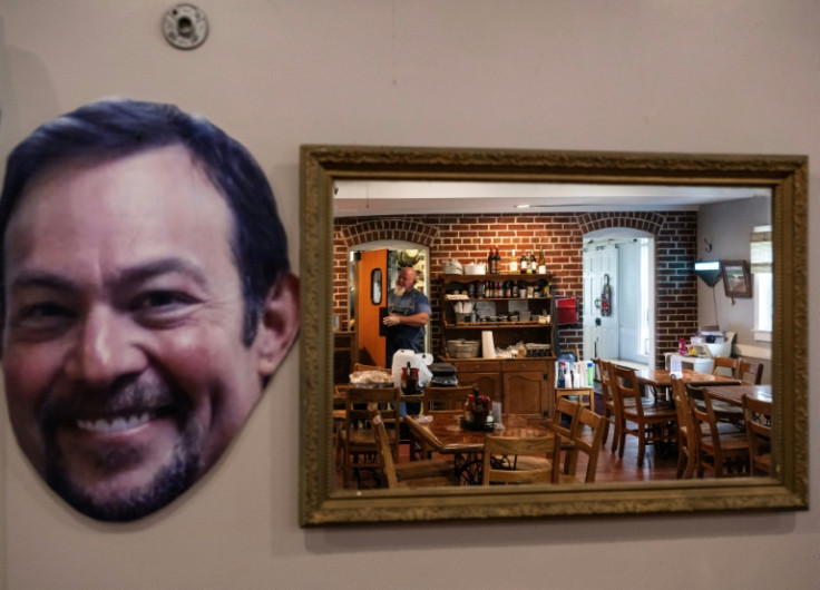 A cut-out poster of conservative radio host Jeff Katz adorns a barbecue restaurant's wall in Ashland, Virginia
