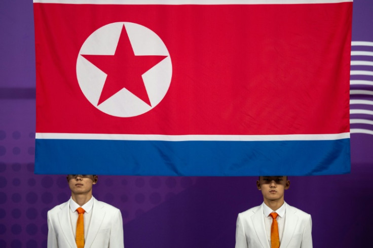 The North Korean flag is hoisted during a medal ceremony at the Asian Games