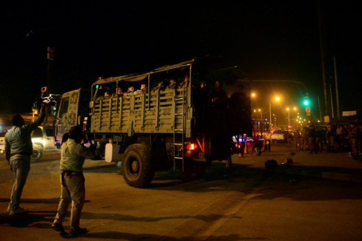Members of the army leave after an operation at Guayas 1 prison. Six suspects in the assassination of presidential candidate Fernando Villavicencio were killed in an incident at the prison