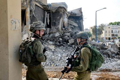 Soldiers outside an Israeli police station that was damaged during battles to dislodge Hamas militants