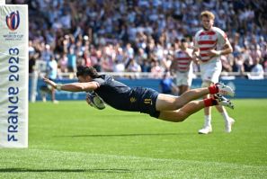 Argentina's Mateo Carreras dives over for one of his three tries against Japan which sent the Pumas into the last eight