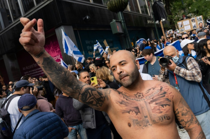 Supporters of Israel face demonstrators rallying in support of Palestinians  near the Israeli consulate general in New York City on October 9, 2023