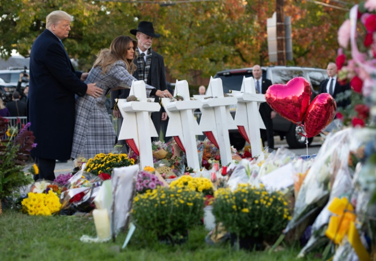 Then-president Donald Trump and his first lady Melania Trump pay their respects at the Tree of Life Synagogue in Pittsburgh in 2018 -- but a leading Jewish advocacy group says Trump is partly to blame for the massacre