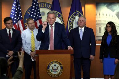 Ousted speaker Kevin McCarthy addresses reporters in Congress in 2022, flanked by Jim Jordan (left) and Steve Scalise, who are both vying to replace him