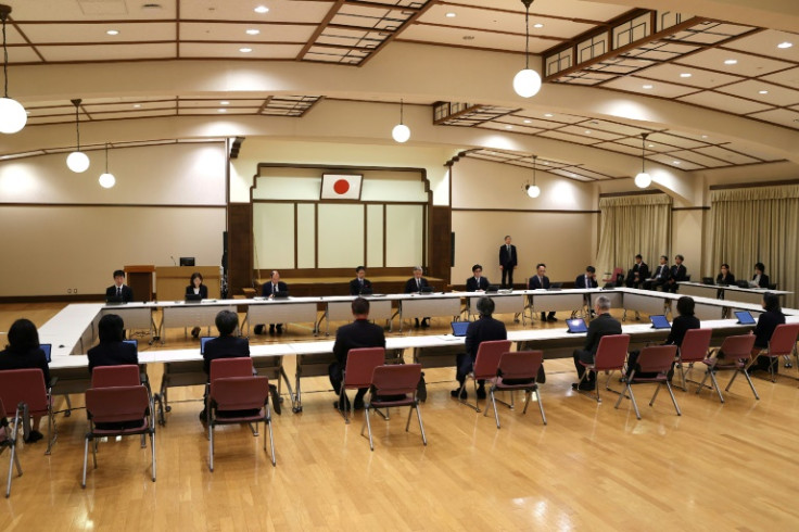 A panel of Japanese religious experts convenes to discuss the potential dissolution of the Unification Church