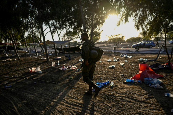 Landau and volunteers reached Beeri, where more than 100 people were killed, with some 270 left dead at the nearby Supernova music festival