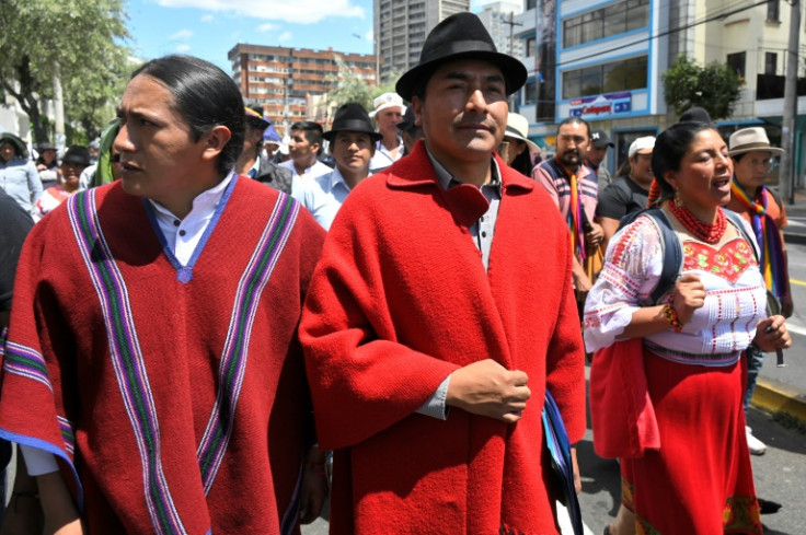 Activists protest against illegal and large-scale mining in Quito on June 13, 2023