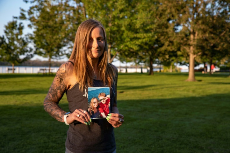 Kim Prosser holds a photo of her late son Ashtyn in Windsor, Ontario, Canada, on September 14, 2023