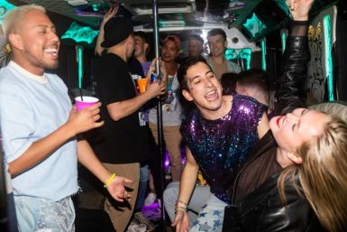 Fans on a party bus dance and sing to Taylor Swift tunes before attending 'Taylor Swift: The Eras Tour' at a Chicago, Illinois theater on October 13, 2023