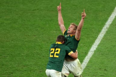 South Africa's Pieter-Steph du Toit and fly-half Handre Pollard celebrate the win