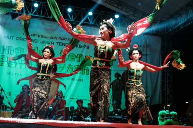 Backed by lively Javanese beats and melodies, the dancers sway their hips, flick their fingers and throw seductive glances at the audience in a Jakarta theatre