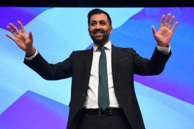 Scotland's First Minister Humza Yousaf reacts after delivering a speech on stage during the Scottish National Party (SNP) annual conference, in Aberdeen, on October 17, 2023