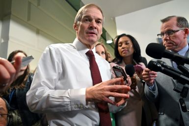 US Representative Jim Jordan (C), R-OH, speaks to the press as he leaves after a Republican party caucus meeting at the US Capitol in Washington, DC, on October 16, 2023