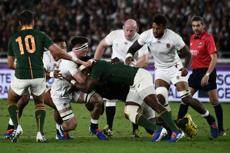 Siya Kolisi tackles England flanker Tom Curry during the 2019 World Cup final in Japan which South Africa won 32-12